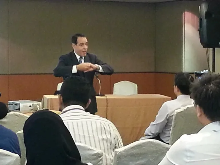 Delivering a scientific lecture at the South East Asian Health Care Conference in Malaysia